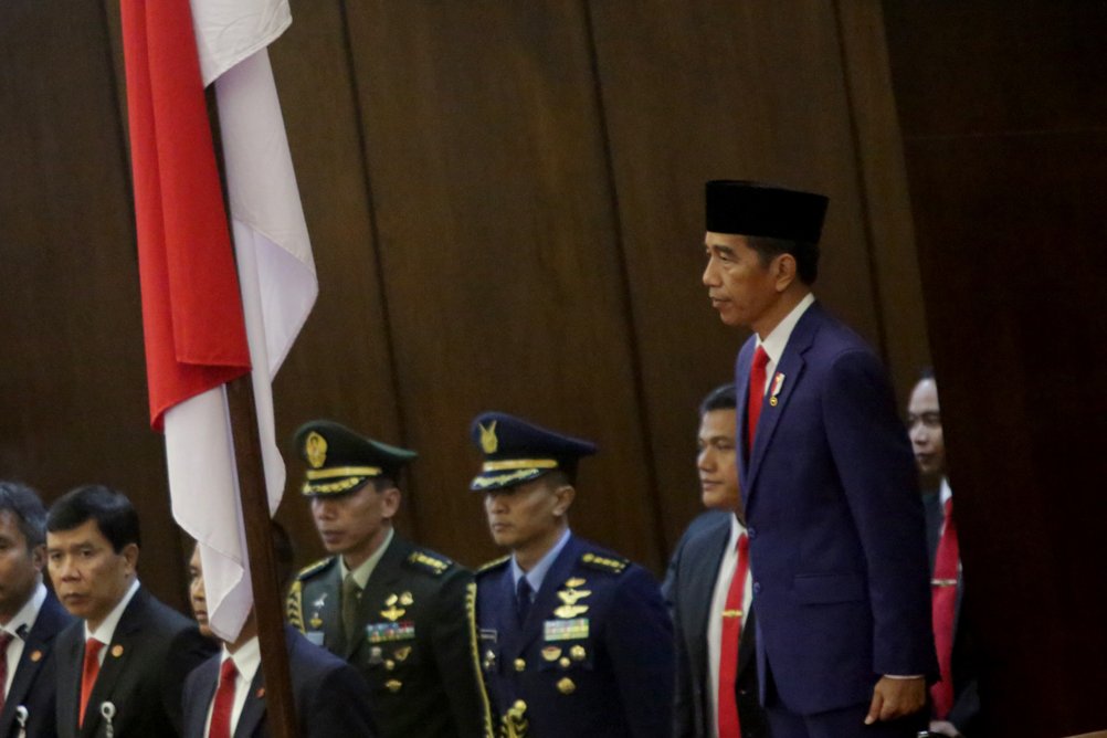 Presiden Jokowi sebelum menyampaikan pidato pada Sidang Tahunan MPR-RI Tahun 2018, di Gedung Nusantara, Jakarta, Kamis (16/8)