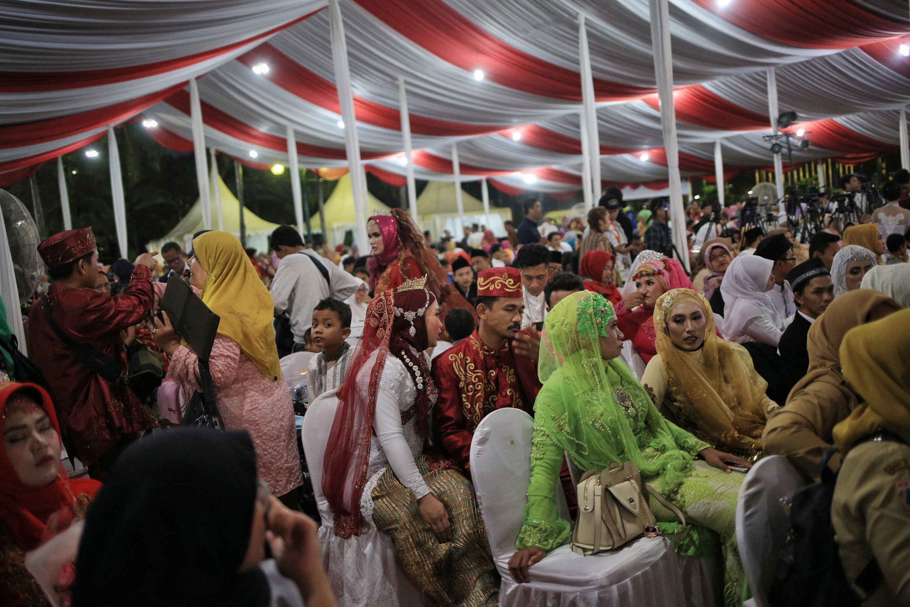  Progam nikah masal gratis yang digelar Pemprov DKI Jakarta yang ke 3 kali ini di ikuti 633 pasangan. 
