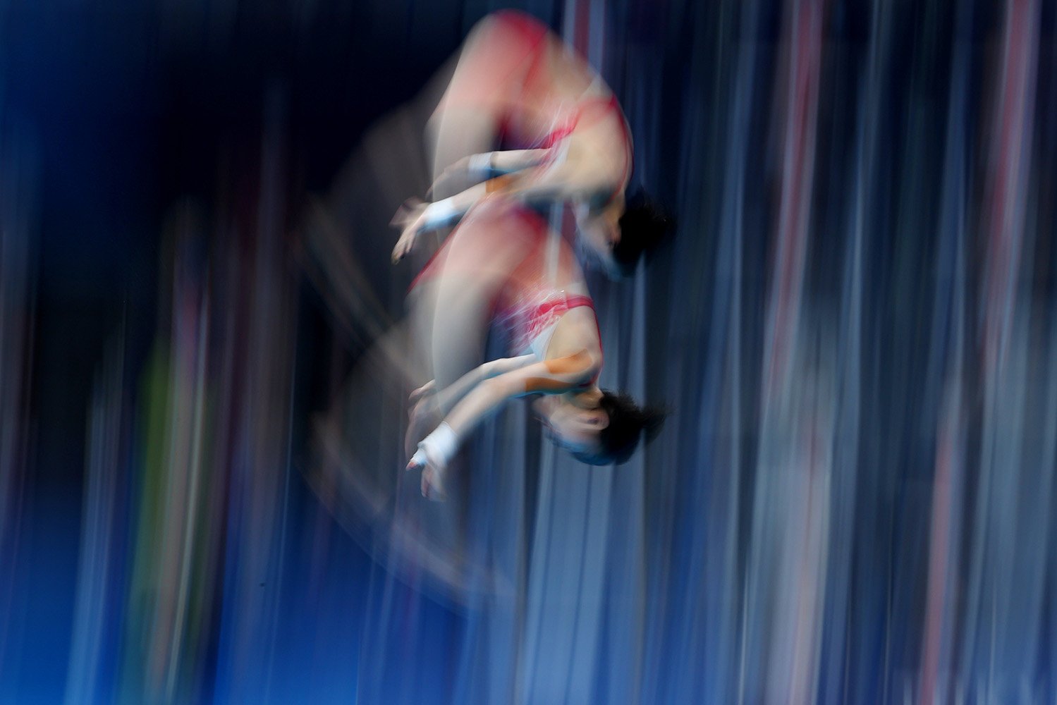 Chen Yuxi dari Tiongkok dan Zhang Jiaqi dari Tiongkok beraksi selama Olimpiade Tokyo 2020 pada Sinkronisasi Platform 10m Final Diving Putri di Tokyo Aquatics Centre, Tokyo, Jepang, Selasa (27/7/2021). ANTARA FOTO/REUTERS/Stefan Wermuth/AWW/sa.