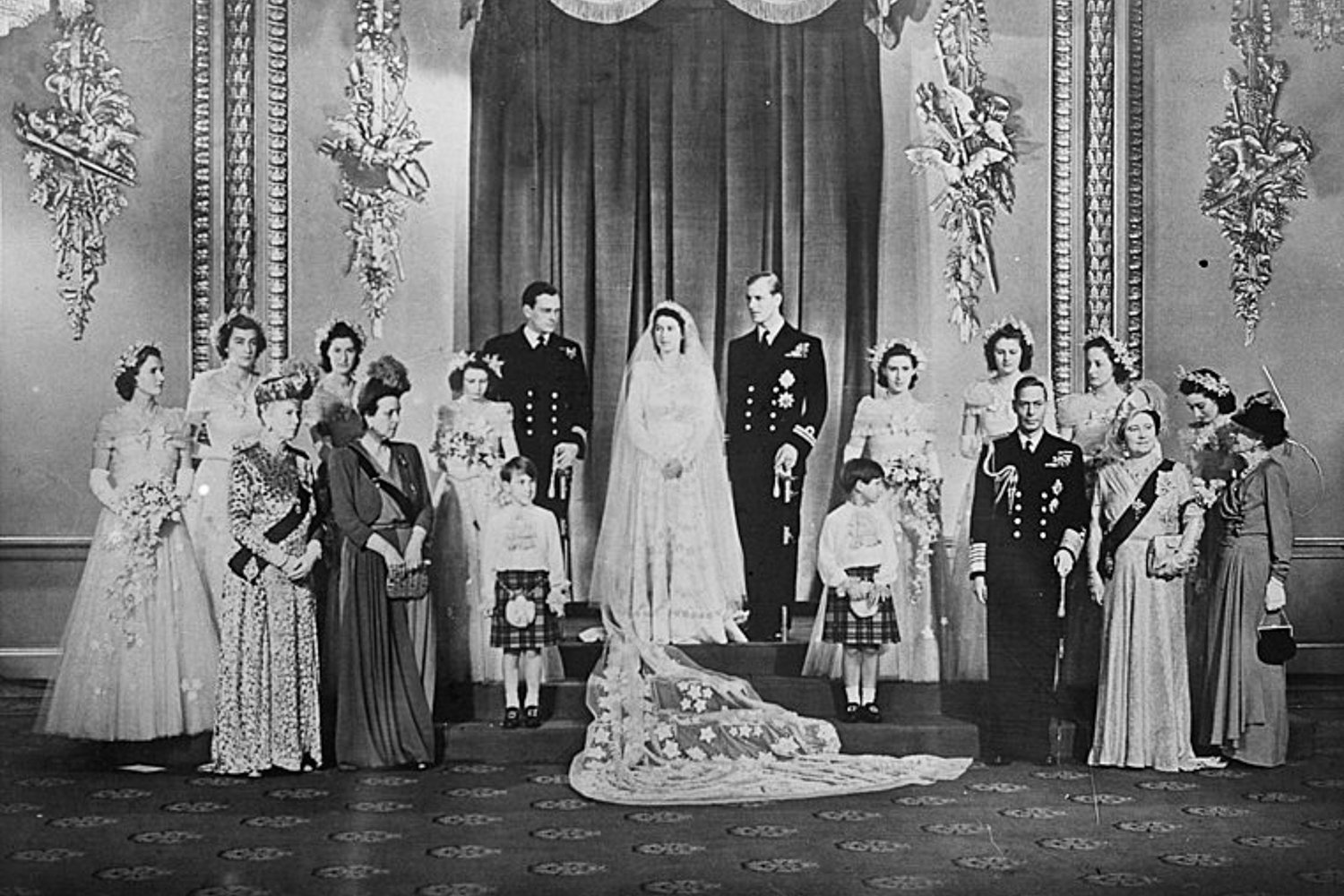 Photograph of Queen Elizabeth II and Commonwealth leaders, taken at the 1960 Commonwealth Conference, front row of Windsor Castle: (left to right) EJ Cooray, Walter Nash, Jawaharlal Nehru, Elizabeth II, John Diefenbaker, Robert Menzies, Eric Louw Back row: Tunku Abdul Rahman, Roy Welensky, Harold Macmillan, Mohammed Ayub Khan, Kwame Nkrumah