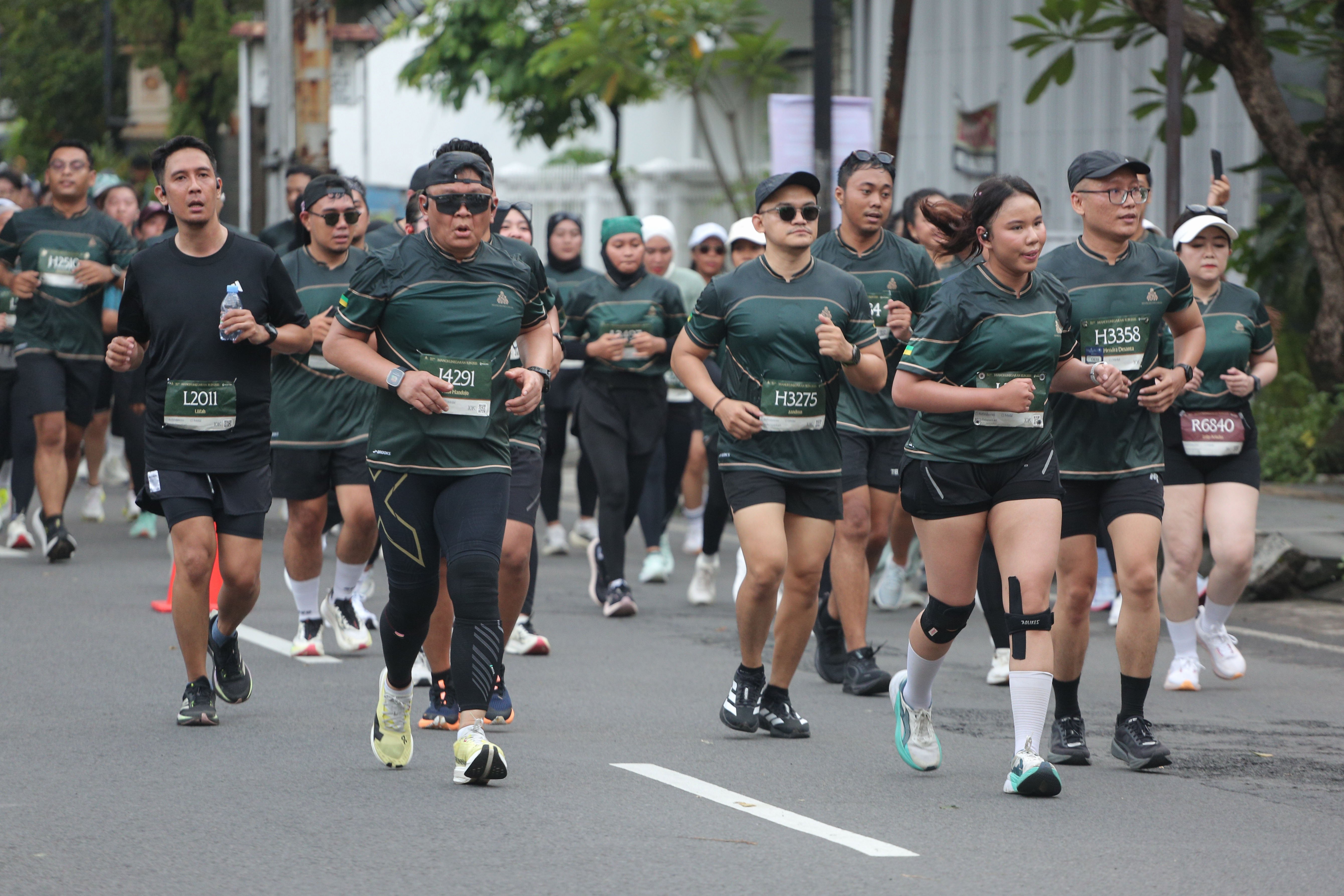Peserta berlari saat mengikuti Mangkunegaran Run 2026 di Solo, Jawa Tengah, Minggu (3/5/2026). Ajang balap lari tersebut digelar dalam rangka Adeging Mangkunegaran ke-269. 