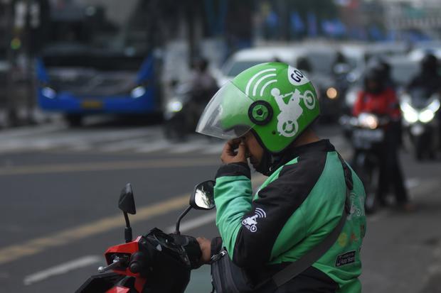 REVISI KENAIKAN TARIF OJEK ONLINE