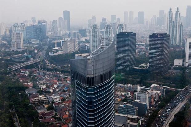 Suasana gedung-gedung perkantoran di DKI Jakarta difoto dari ketinggian. Jakarta dinilai memiliki ekosistem perkembangan startup yang lebih baik dibandingkan sejumlah kota di Asia lainnya seperti Mumbai, Seoul, dan Tokyo.