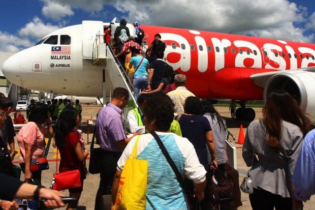 Akibat Corona, AirAsia Setop Seluruh Penerbangan Indonesia per 1 April.