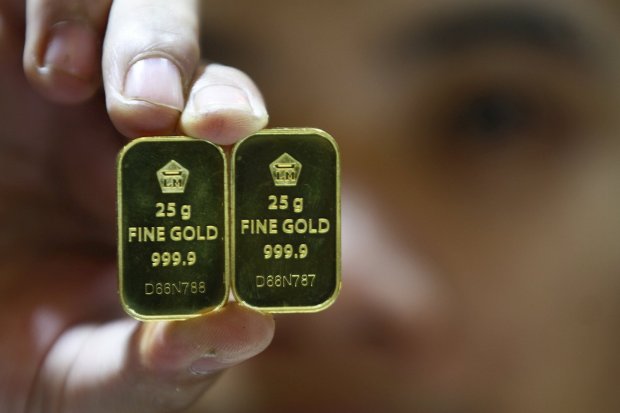 Harga emas Antam Jumat (4/10) naik sejalan dengan kenaikan harga emas global. 