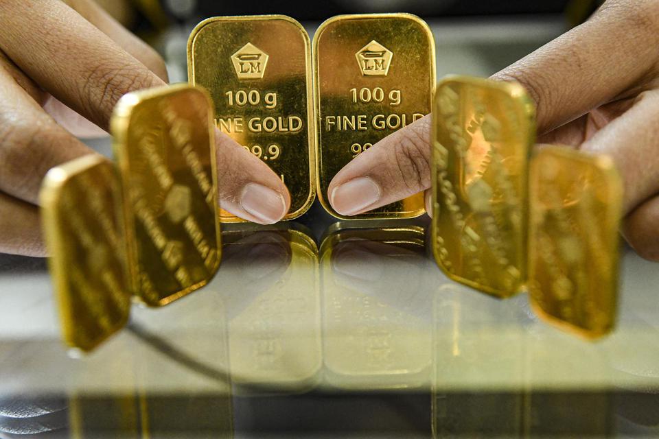 Ilustrasi, emas batangan produksi PT Aneka Tambang Tbk (Antam). Antam berharap tren positif harga emas mampu menopang kinerja perseroan ke depan setelah sepanjang semester I 2020 membukukan penurunan laba sebesar 80,18% menjadi Rp 84,82 miliar.