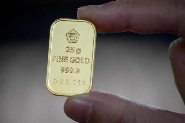 Ilustrasi, emas batangan PT Aneka Tambang Tbk. Harga emas di pasar spot tercatat melemah tipis 0,07% menyentuh level US$ 1.697,42 dipengaruhi antusiasme pelaku pasar terhadap prospek pemulihan ekonomi. 