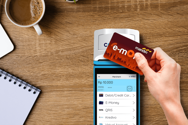 Ilustrasi pembayaran dengan e-money melalui mesin milik Cashlez kinerja