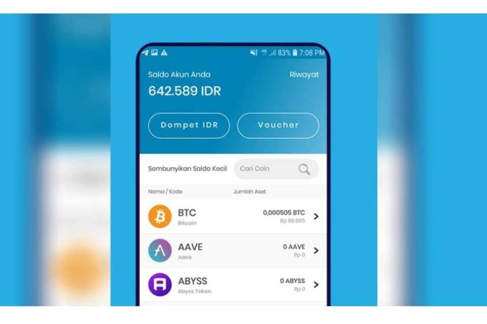 Smartphone yang menampilkan layar aplikasi Indodax