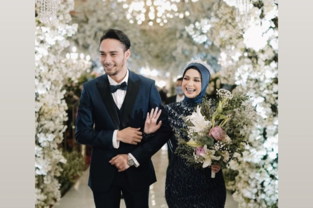 Achmad Megantara dan Asri Faradila