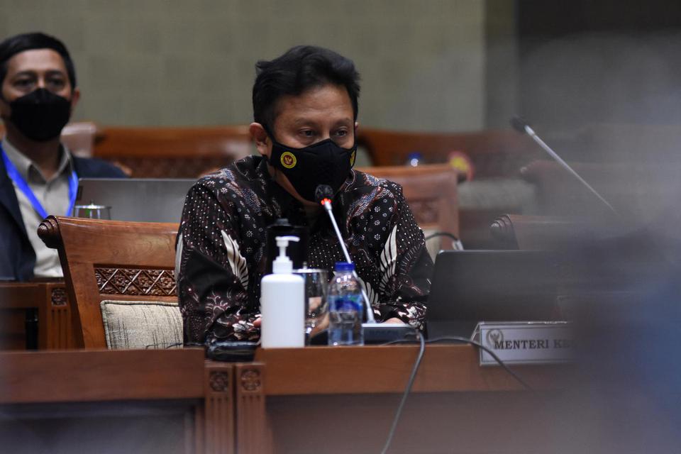 Menteri Kesehatan Budi Gunadi Sadikin mengikuti rapat kerja dengan Komisi IX DPR di Kompleks Parlemen, Senayan, Jakarta, Senin (30/5/2022). Rapat kerja itu membahas penjelasan tentang platform Indonesia Health Service (IHS) yang terintegrasi dengan BPJS K