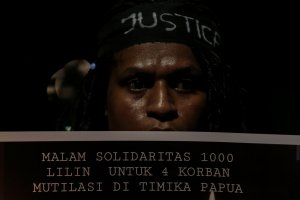 Unjuk Rasa Solidaritas 1000 Lilin untuk Korban Mutilasi di Papua