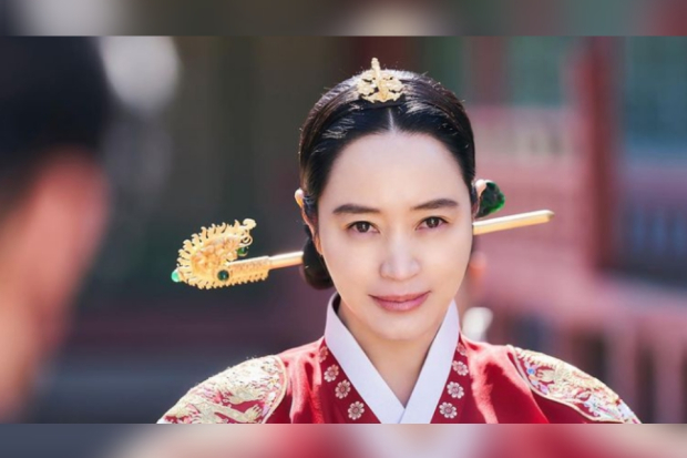 Under the Queens Umbrella