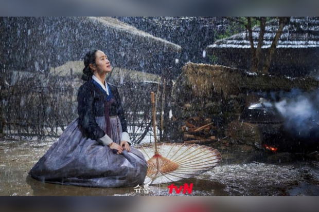 Under the Queens Umbrella