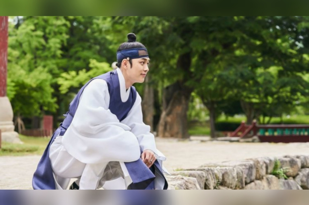 Under the Queens Umbrella