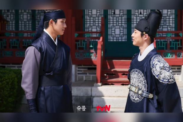 Under the Queens Umbrella