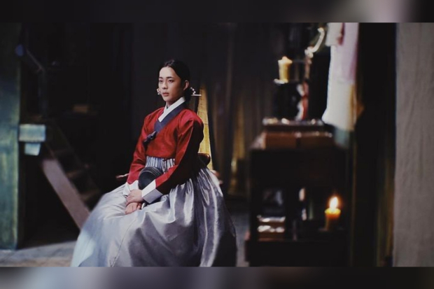 Under the Queens Umbrella