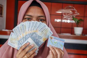 PENYALURAN BANTUAN SUBSIDI UPAH