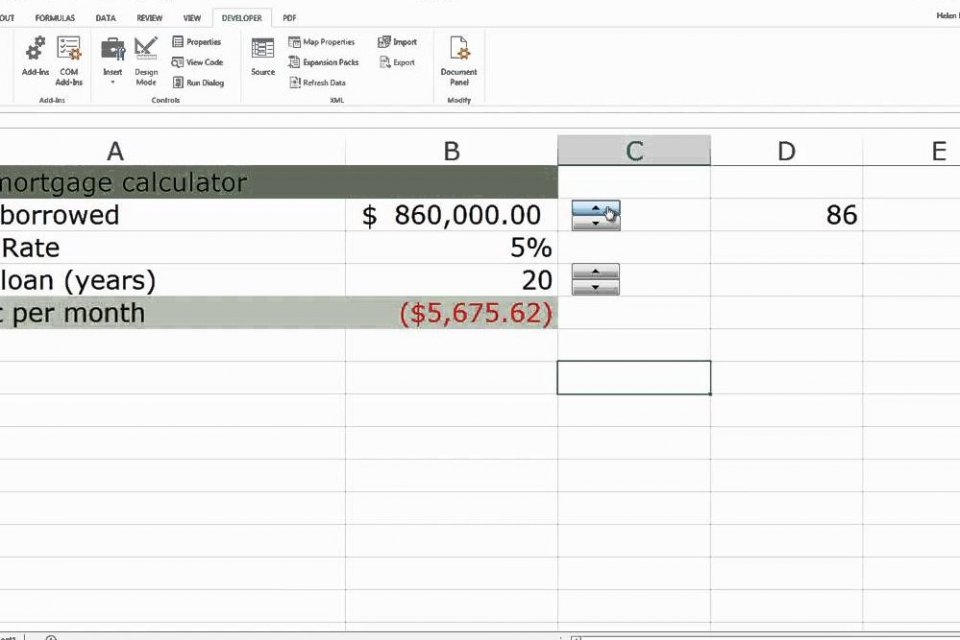 Cara membuat spin button di Excel 2007.