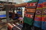 KAIN ULOS TEMBUS PASAR INTERNATIONAL