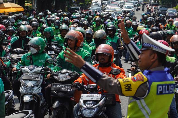 Kemenaker Kaji Aturan THR bagi Driver Ojol, Status Kemitraan Jadi Perdebatan