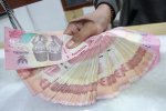 Nilai Tukar Rupiah Melemah di Angka Rp16.412 per Dolar AS