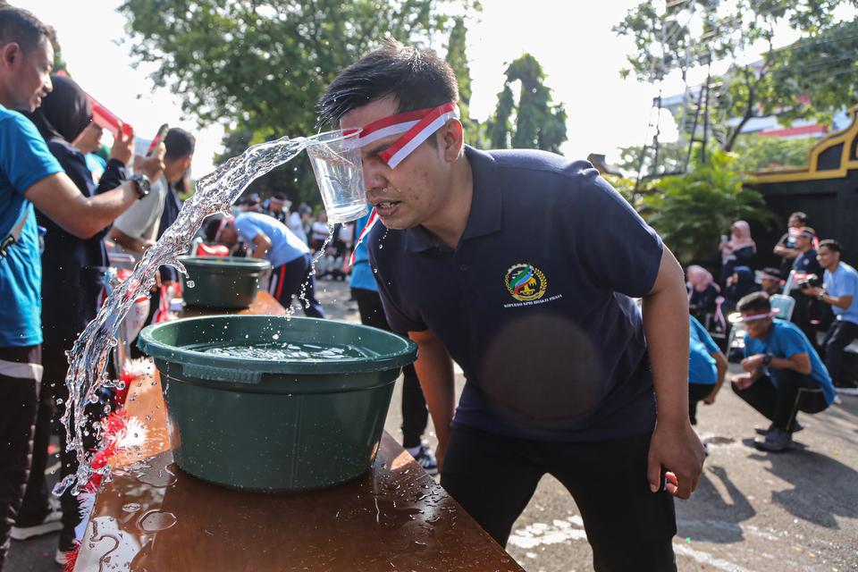 Contoh pengumuman lomba 17 Agustus.