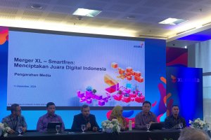 Konferensi pers kesepakatan merger antara XL Axiata dan Smartfren