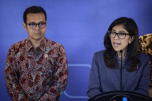 Konferensi pers penggabungan XL Axiata dan Smartfren