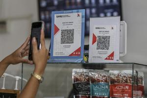 Volume transaksi QRIS melonjak pada April 2025