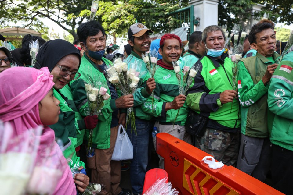 grab dan gojek akan merger,
