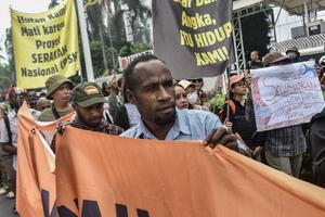 Aksi menolak deforestasi di tanah Papua