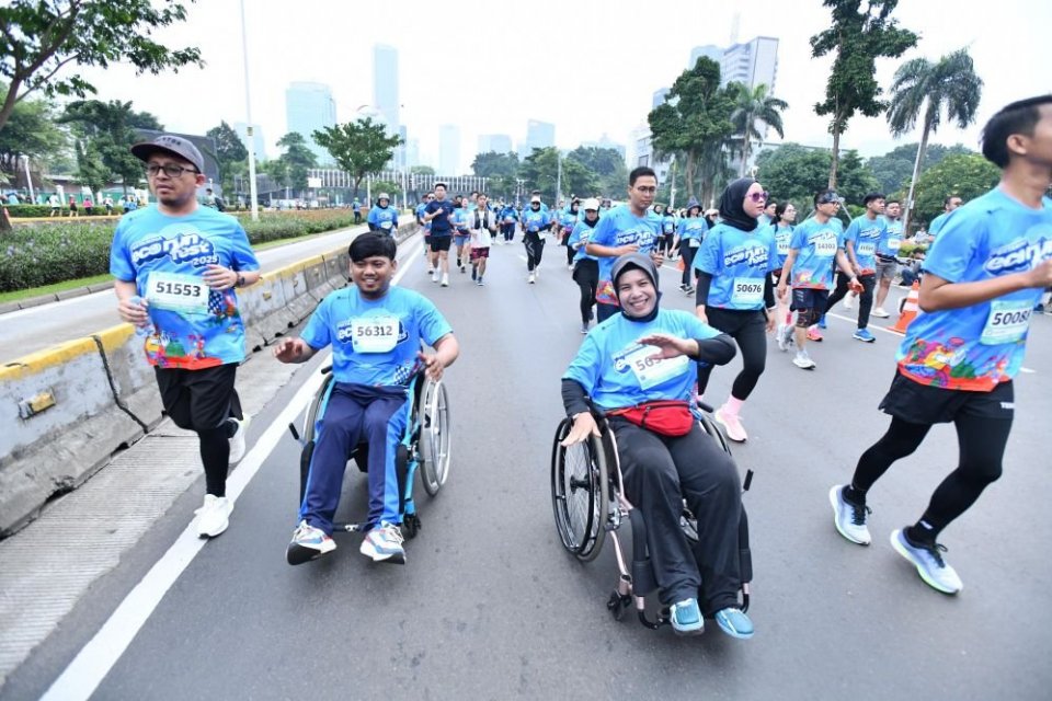 Peserta disabilitas ikut berpartisipasi di Pertamina Eco RunFest 2025. Event lari ini menunjukkan semangat inklusif dan kebersamaan bahwa setiap langkah memiliki makna tanpa batas.