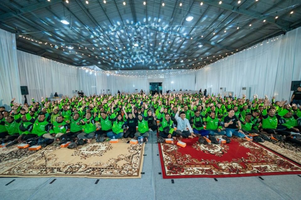 Ratusan ribu Mitra Juara Gojek menerima sosialisasi dan bantuan iuran BPJS Ketenagakerjaan serta Kesehatan dalam Program Apresiasi Mitra di Surabaya (10 Desember 2025).