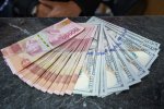 Nilai tukar rupiah ditutup melemah ke level Rp18.109 per dolar AS (Foto: Katadata/Fauza Syahputra)
