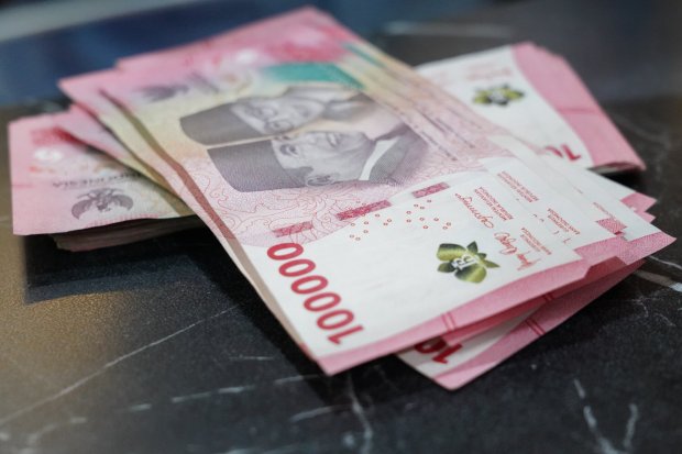 Nilai Tukar Rupiah Melemah Rp 18.009 per dolar AS (Foto: Katadata/Fauza Syahputra)