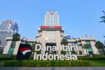 Ilustrasi logo Danantara dan gedung Danantara Indonesia