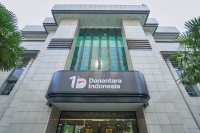 Ilustrasi logo Danantara dan gedung Danantara Indonesia