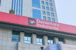 Ilustrasi logo Danantara dan gedung Danantara Indonesia