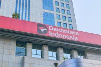 Ilustrasi logo Danantara dan gedung Danantara Indonesia