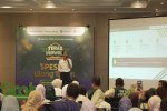 Sesi pemberian materi pemasaran digital melalui GrabAds bagi para Mitra GrabMerchant dalam acara Teras Perwira Spesial Ulang Tahun 2026 di Jakarta.